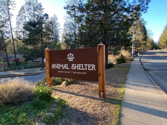 The new two-sided custom sign on Freeman Lane.