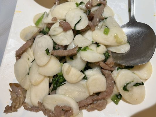 Stir-fried rice cakes with sliced meat/肉片炒年糕