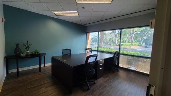 Large private office for up to four. Great natural light. Flexible furniture arrangement options.