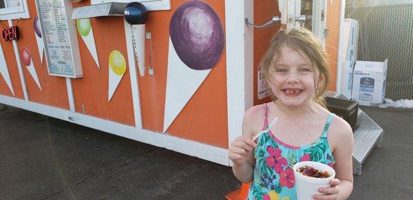 Enjoying a snow cone on a perfect spring day!