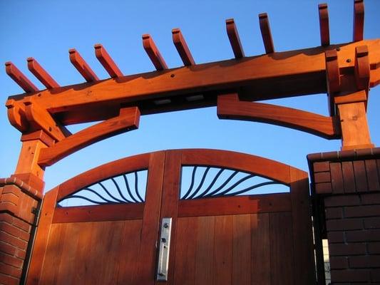 redwood entry arbor and gates with metal inserts