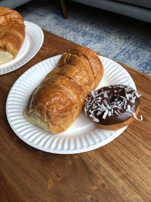 Ham and cheese croissant and a chocolate coconut cake donut