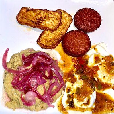 Tres Golpes - Mangú, pickled red onions, eggs, special salsa, fried cheese, salami