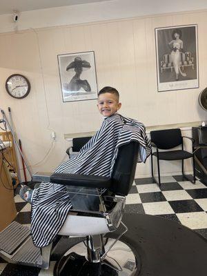 My big boy finishing up his haircut!