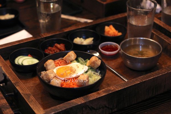 Tofu Bibimbap ($17.99) - purple rice, carrot, edamame, zucchini, cabbage, radish, bean sprout, sunny side up egg