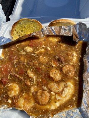 Lunch special: gumbo & grits! Amazing!  Came with drink and cake for only $10!