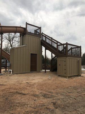 New construction and painting for pool stairs with storage.