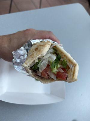 Not enough meat for me, watery tzatziki and marinated onions and tomatoes. C+