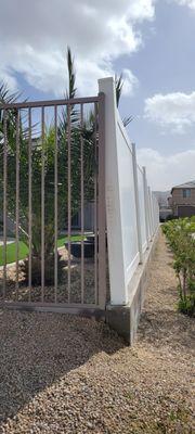 Nothing ankered to keep fence from swaying in the wind.