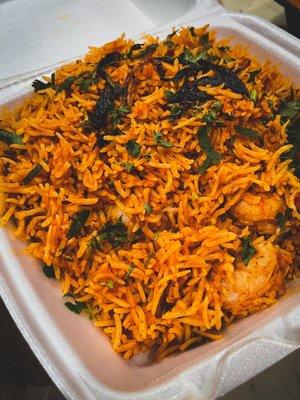 Shrimp biryani in takeout container