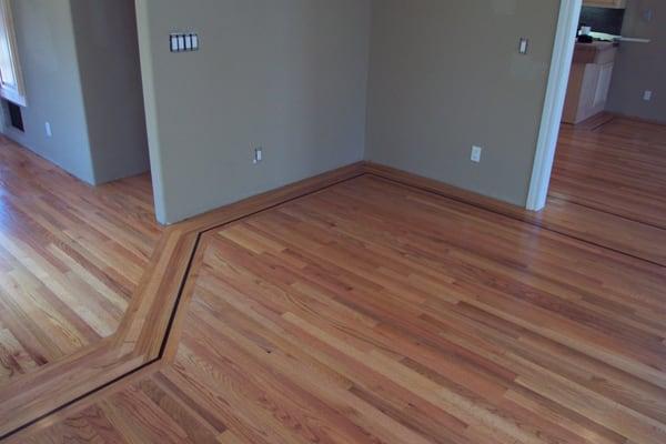 Red Oak with Walnut Feature Strip.