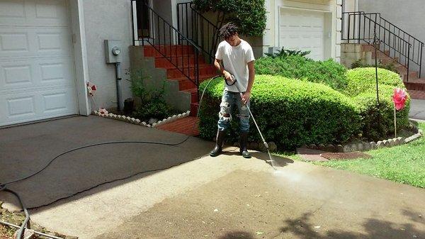 Driveway being pressure washed