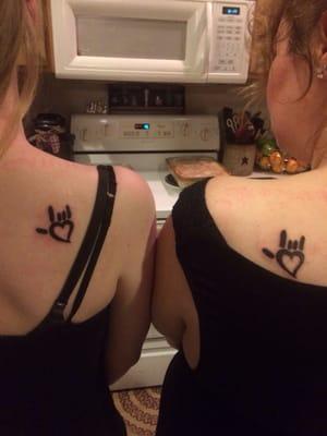 Mother & daughter Tattoo!  The 'I Love You' sign language symbol!