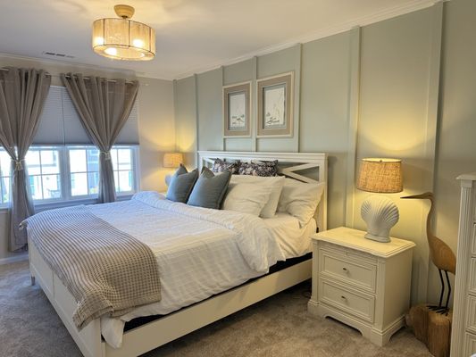 Master bedroom with painted slats on the accent wall