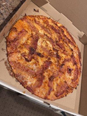 Cheese bacon pizza. The cardboard looked more appealing!