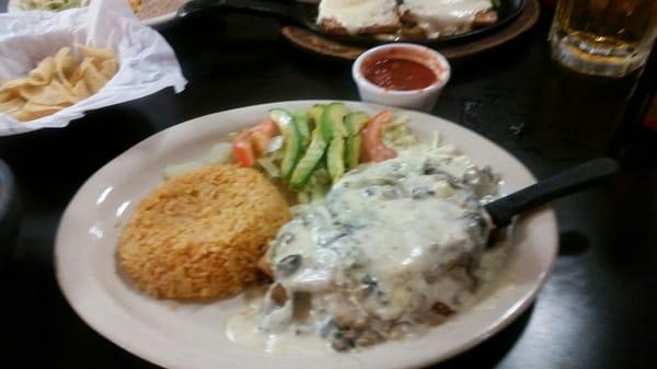 Traditional Chile Relleno with meat and cheese sauce.