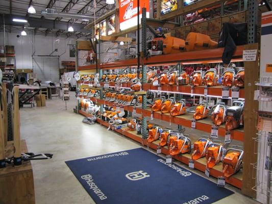 Madsen's display of their full line of pro chain saws.