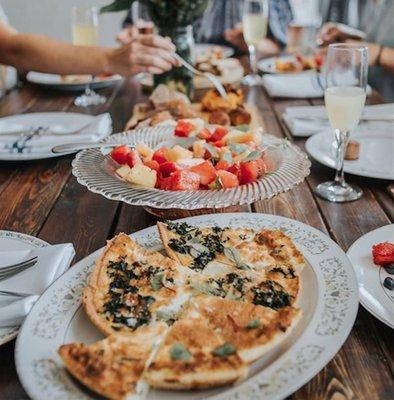 Goat cheese, mushroom & arugula quiche, fruit salad from our brunch menu