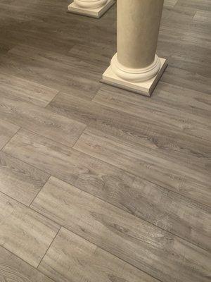 My new floors: kinda grayish/brown luxury vinyl plank