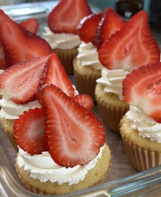 Tres Leches cupcakes with a chantilly cream cheese frosting.