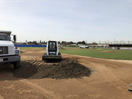 Dirt clean-up/removal on baseball field