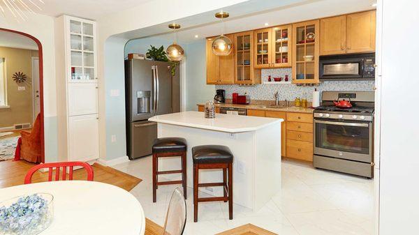 A wall was removed, merging the dining room and kitchen