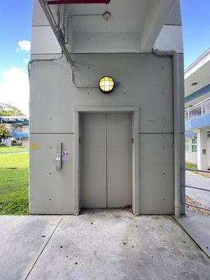 Red interior Broward/Miami elevator, Broward College North building 51