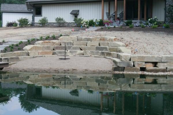 Customer Retaining Wall using Napoleon Stone Sawn Outcropping