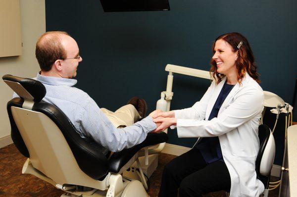 Dr. Davies meeting with a patient.