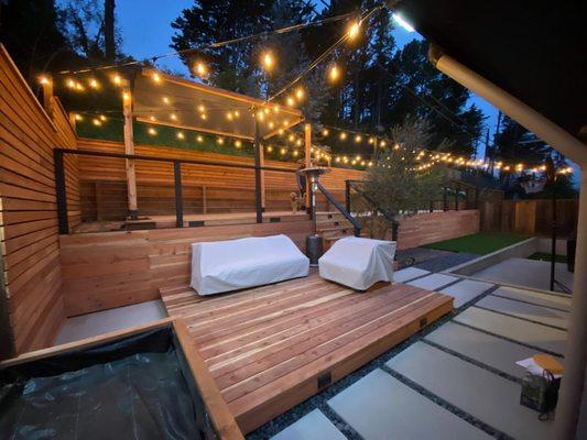 Deck, pergola, patio, concrete slabs, lights....