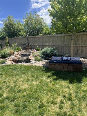 Water feature with surrounding plants