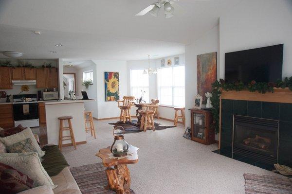 Living room inside a two bedroom apartment at Hunter's Trail