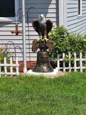 Large eagle on bell