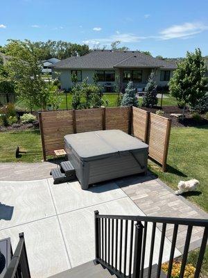 He built the fence around the hot tub