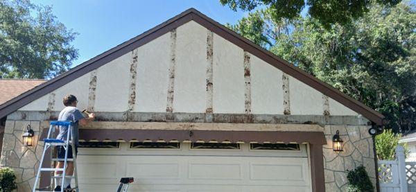 Termites and time destroyed this trim, Handy Hucks working on removing all old nails and filling holes with concrete fillers.