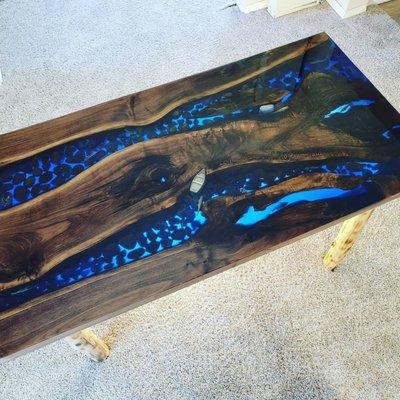 Nothing like a beautiful dining table made with epoxy and black walnut.