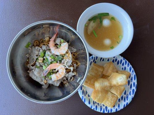 mi nam vang: egg noodles topped with pork belly, ground pork, shrimp + green scallions = $10