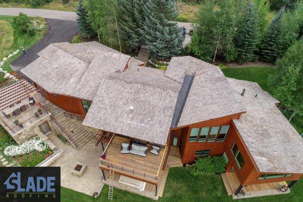 Before pictures of the roof on N West Ridge Rd in Jackson Wy.