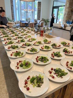 Prepping salads at our venue!