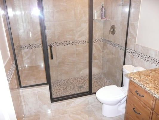 Custom Tile shower and glass in Bathroom remodel