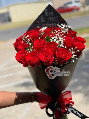 Personalized bouquet with two dozen roses.