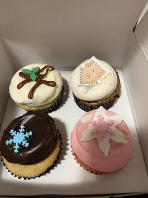 December cupcakes!! Sticky Toffee Pudding, sugar cookie, Santa's Chocolate Chip, and Gingerbread cheesecake