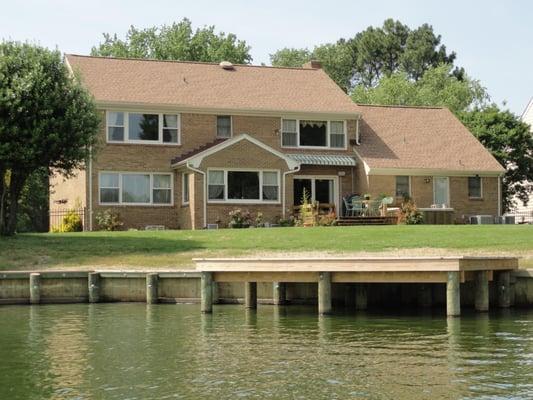 This Lake side beauty has waterfront access and water views from the front and the back! Tucked away in Haygood Point.