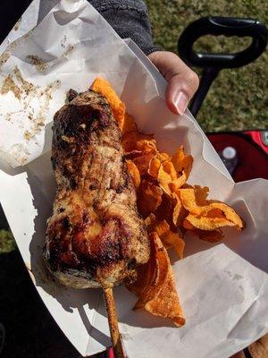 Grill chicken on a stick with sweet potatoes fries