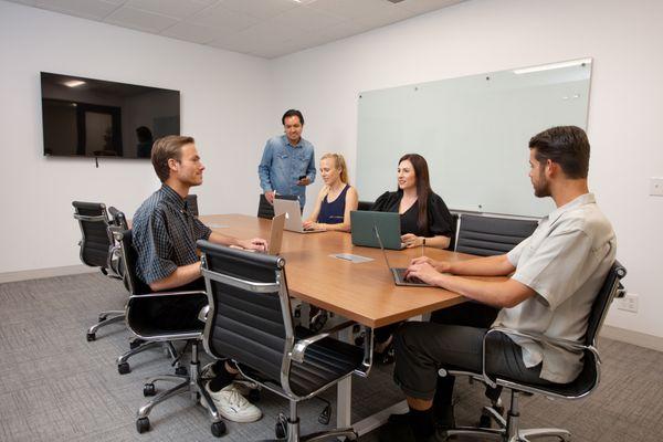 Conference Room with whiteboard and TV connectivity