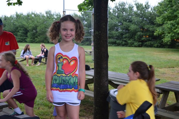 One of our campers!  We love her shirt and are so glad she loves Frogbridge too!