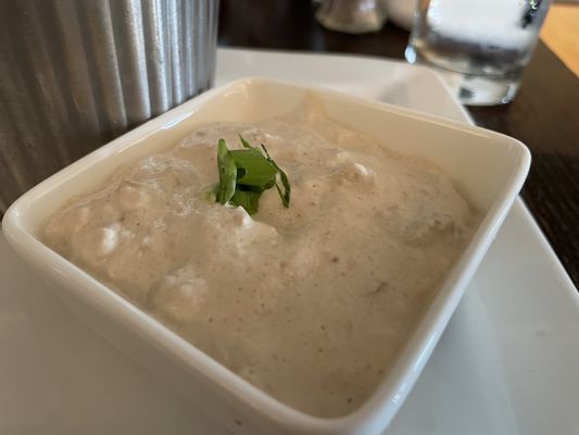 Clam dip that comes with house made salt and vinegar chips. A delightful appetizer