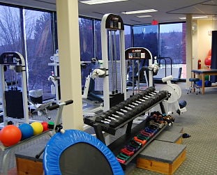 The main gym area of Blue Hills Sports and Spine Rehabilitation's Braintree office