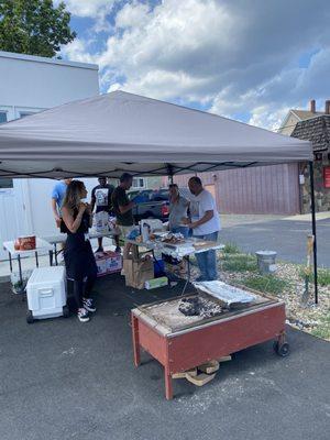 This is Fat Jim roasting a pig on premises for one of our local vendor events for our customers!