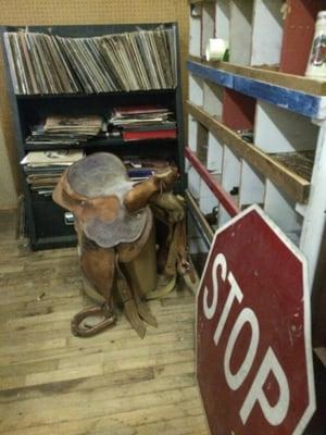 Lots of old signs, saddles, vinyl etc.